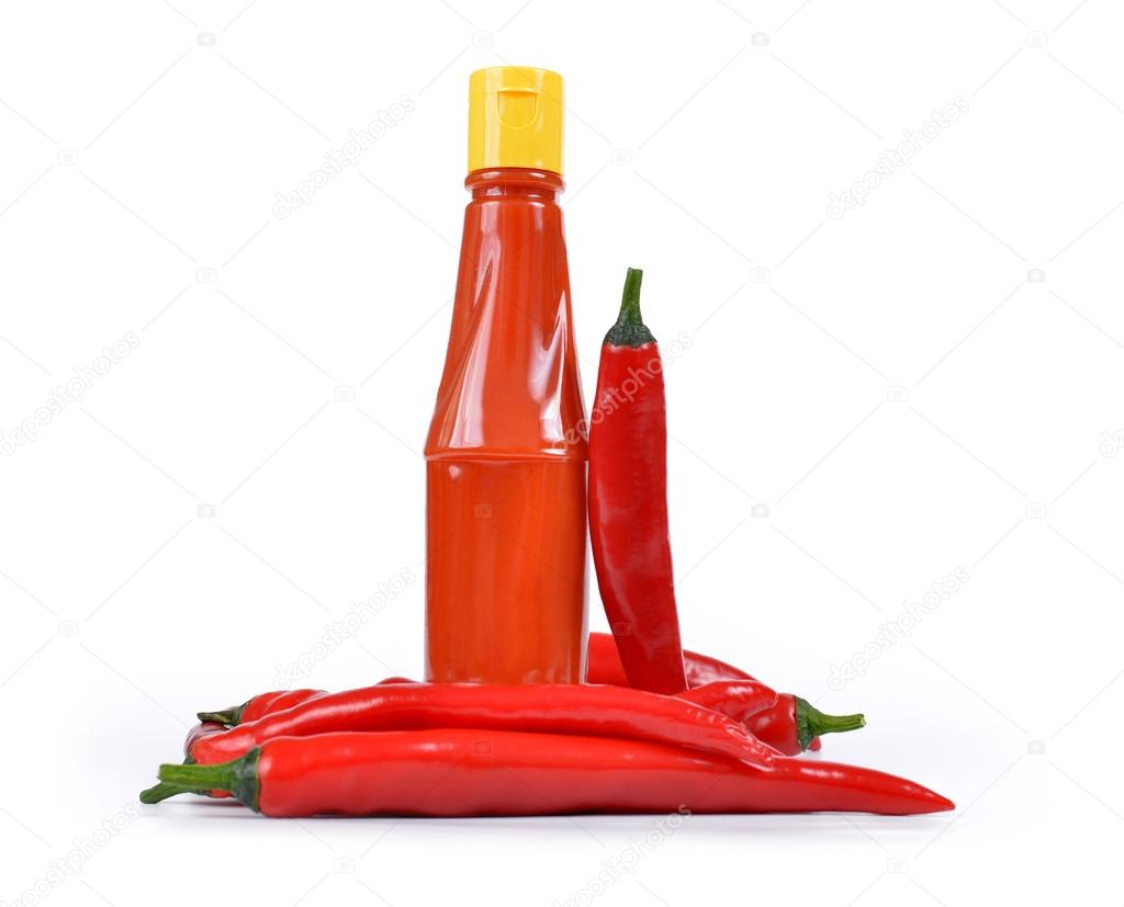 Hot sauce in bottle with Red chili pepper
