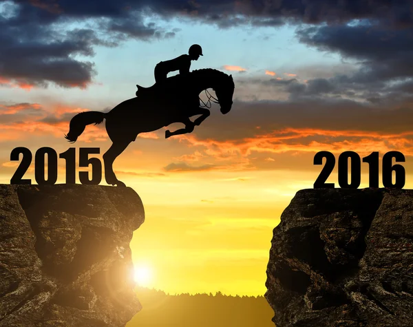 The rider on the horse jumping into the New Year 2016 — Stock Photo, Image