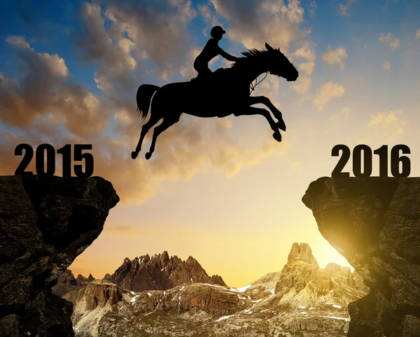 The rider on the horse jumping into the New Year 2016 — Stock Photo, Image