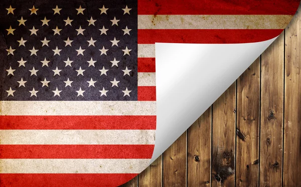 Grunge amerykańską flagę toczenie strony — Zdjęcie stockowe