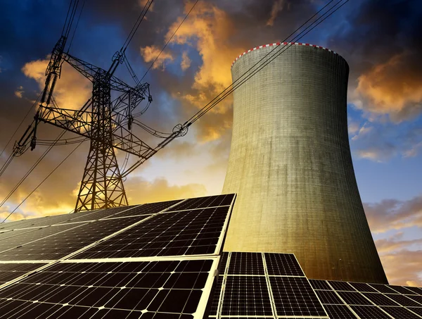 Solar energy panels, nuclear power plant and electricity pylon — Stock Photo, Image