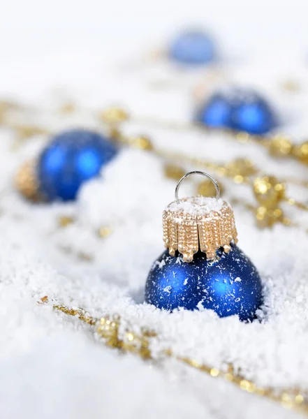 Christmas decorations in snow. — Stock Photo, Image