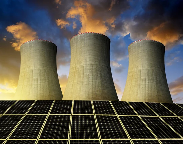 Solar energy panels and nuclear power plant — Stock Photo, Image