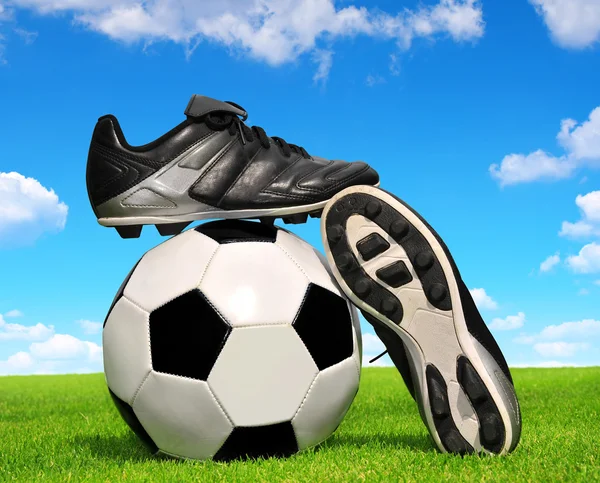 Soccer ball and shoes — Stock Photo, Image