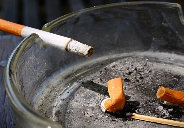 Cigarette in an ashtray — Stock Photo, Image