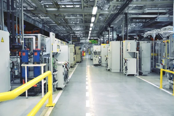 Factory with computers and robots. — Stock Photo, Image