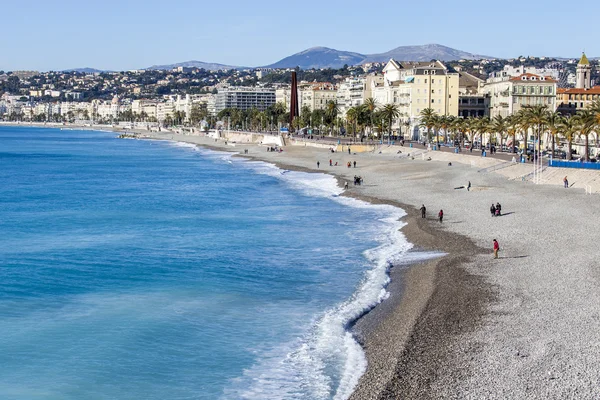 NICE, FRANCE - on JANUARY 13, 2016. City landscape. View of a beach in the winter sunny day — Stock Photo, Image