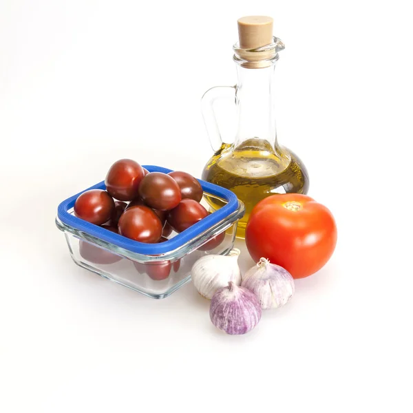 Products and kitchen utensils for cooking of seasoning from garlick and tomatoes — Stock Photo, Image