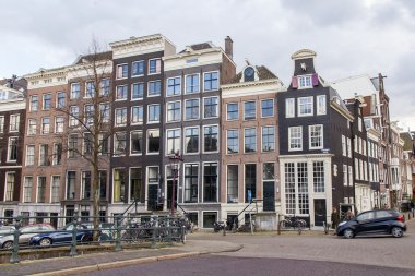 Amsterdam, Hollanda üzerinde 27 Mart 2016. Tipik kentsel görünümü bahar akşamları. 