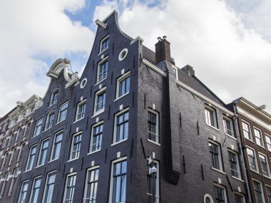 Amsterdam, Hollanda üzerinde 27 Mart 2016. Tipik mimari detaylarını evler XVII-XVIII İnşaat
