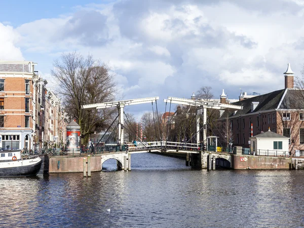 AMSTERDAM, NETHERLANDS on MARCH 27, 2016. Typical urban view. — Stock Photo, Image