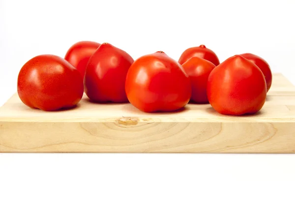 Los tomates frescos de guinda a la mesa — Foto de Stock