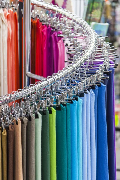 Traditional French scarfs of various colors on a show-window of shop — Stock Photo, Image