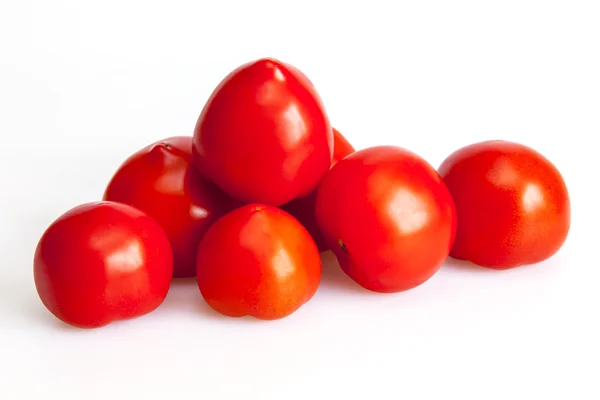 Tomates rojos maduros en la mesa —  Fotos de Stock