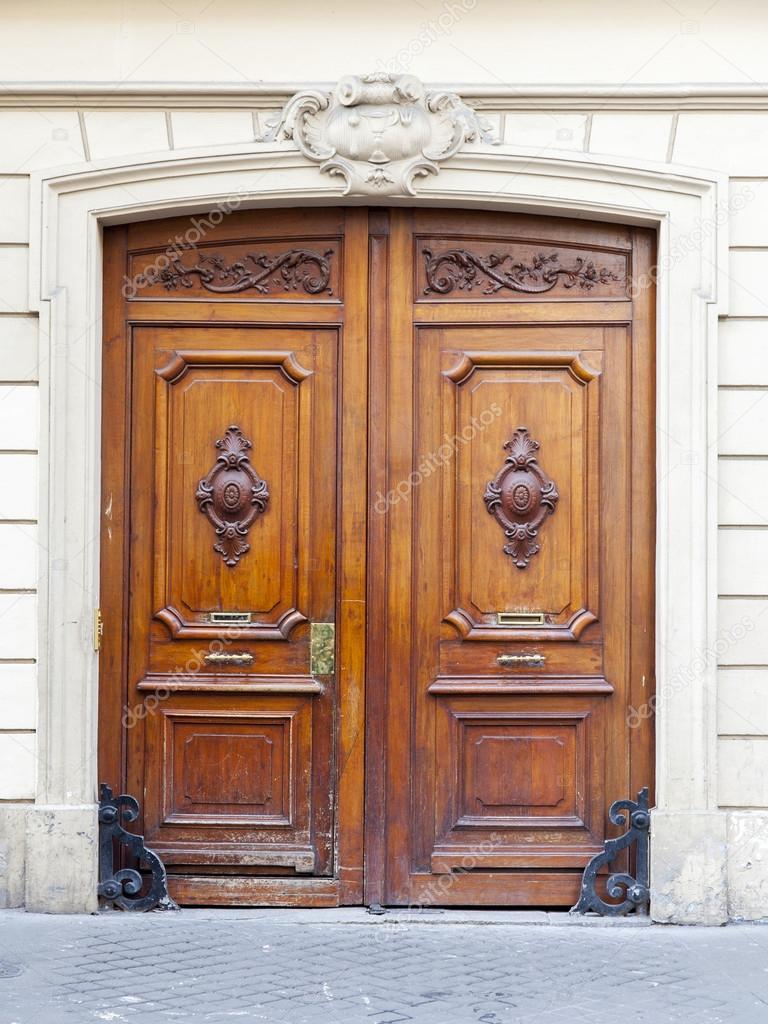 PARIS, FRANCE, on JULY 7, 2016. Typical architectural details of facades of historical building. Entrance door