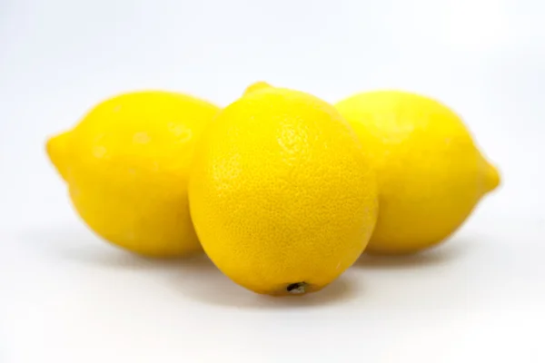 Lemons lie on a table — Stock Photo, Image