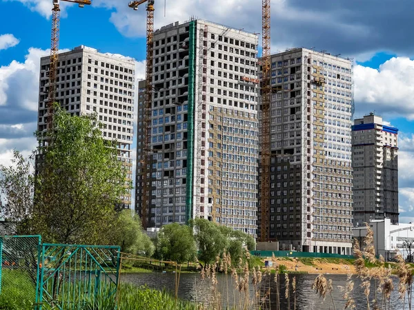 Pushkino, Russia, May 18, 2021. New multi-storey residential buildings on the banks of the Serebryanka river