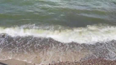 Deniz dalgası ve ıslak taşlar, arka plan