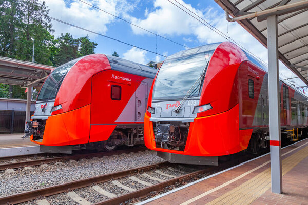 Svetlogorsk, Russia, June 24, 2021. Regional train near the railway station platform