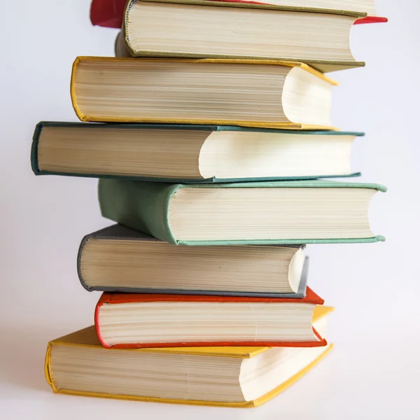 Pile of vintage books in multi-colored covers — Stock Photo, Image