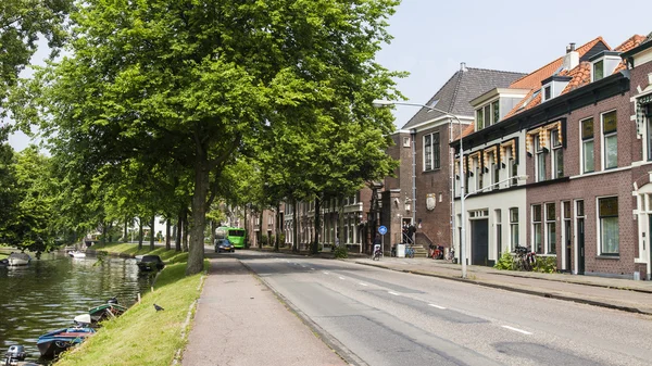 Haarlem, Netherlands, on July 11, 2014. Typical urban view with old buildings on the bank of the channel — Stock Photo, Image