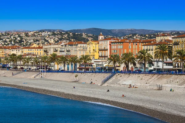 Nice, France, on October 16, 2012. View of the English promenade (Promenade des Anglais) and beach. Promenade des Anglais in Nice - one of the most beautiful and known embankments in Europe