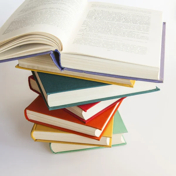 Rough pile of vintage books in multi-colored covers — Stock Photo, Image