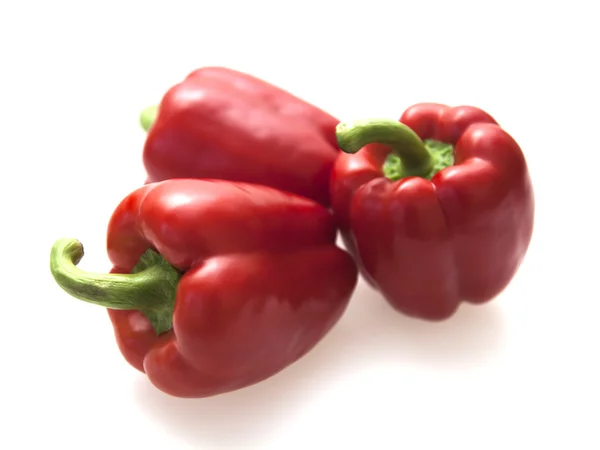 Три великих червоного солодкого перцю — стокове фото