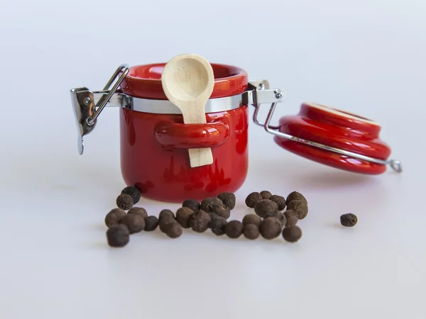 Red capacity for spices and pepper — Stock Photo, Image