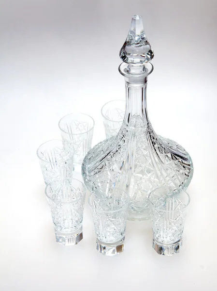 Ware for table layout. Crystal shot glasses and decanter — Stock Photo, Image