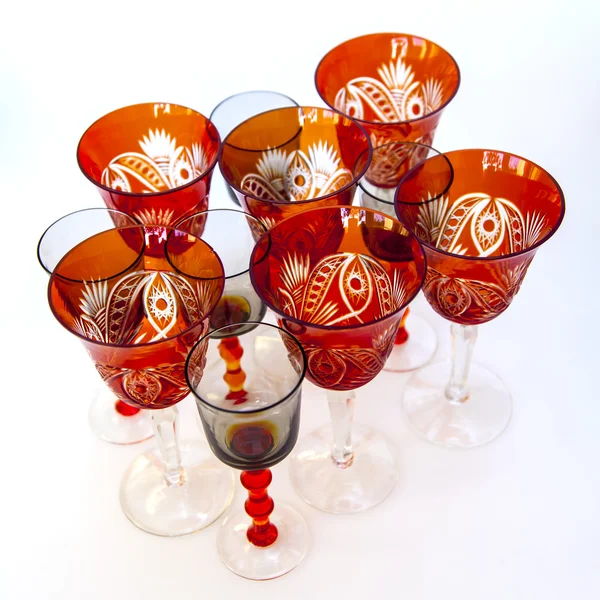 Ware for table layout. Crystal shot glasses and wine glasses — Stock Photo, Image