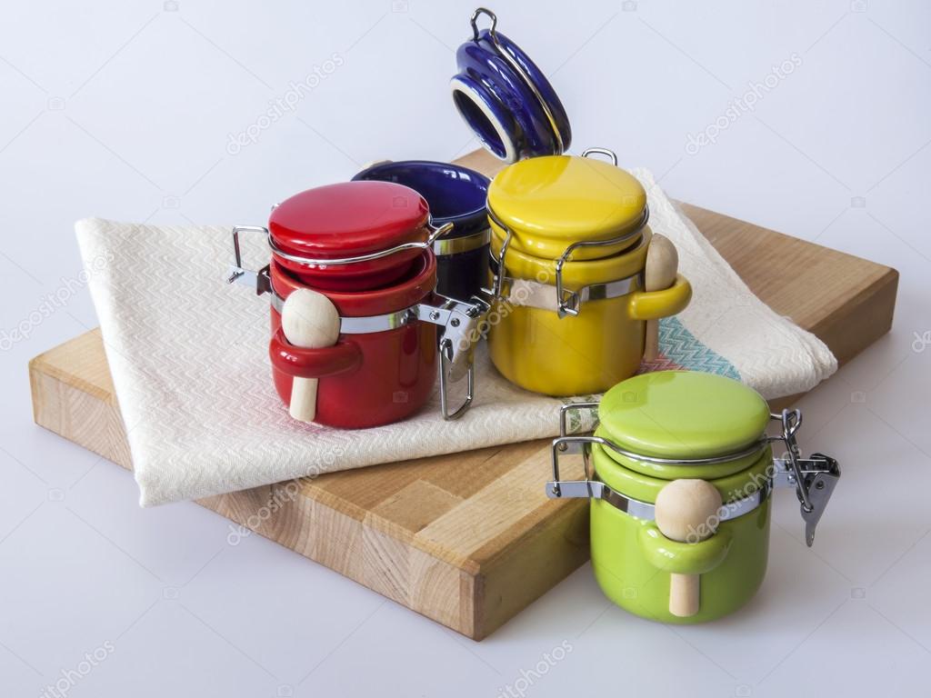 Kitchen utensils: multi-colored containers for spices