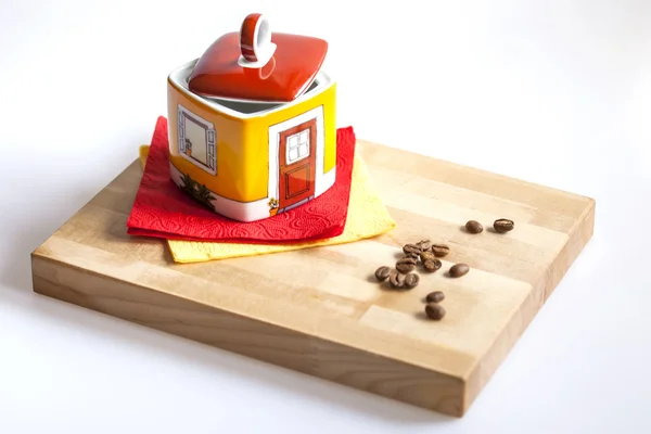 Ceramic capacity for storage of coffee and the fried coffee grains — Stock Photo, Image