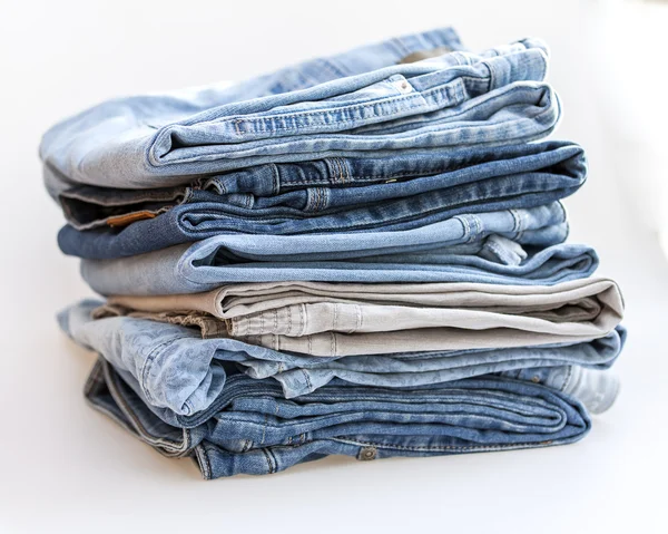 The jeans of various shades in a pile — Stock Photo, Image