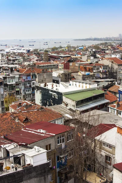 Istanbul, Turkey. April 28, 2011. A view of houses on the bank of the Bosphorus. Urban roofs.