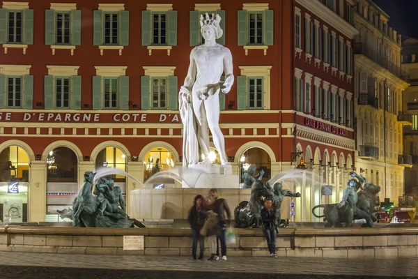 Nice, France, on March 13, 2015. The fountain on Massena Square in evening illumination. Massena Square is the downtown — Stock Photo, Image