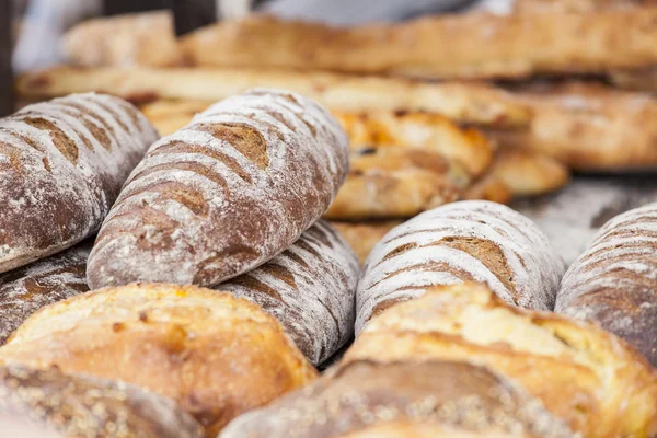 Newly-baked bread on a show-window — Stock Photo, Image