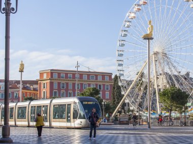 Nice, France, on March 7, 2015. City landscape. Скоростнй the tram goes on Massen Square