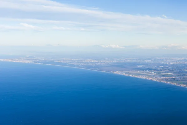 stock image View of a terrestrial surface from a window of the flying plane