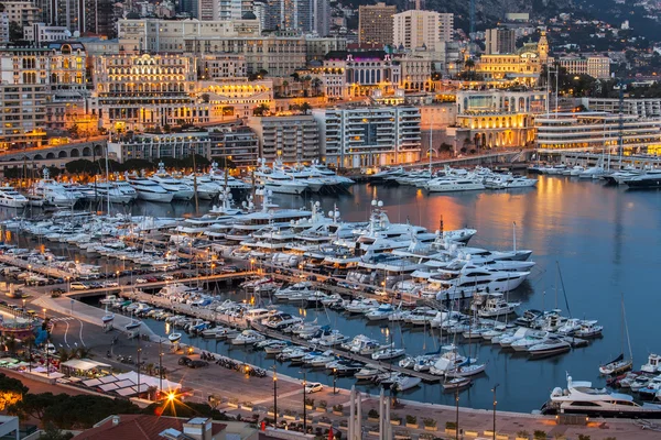 Monte-Carlo, Monaco, on March 8, 2015. The top view on the port and the residential area at night — Stock Photo, Image