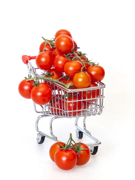 Tomates cereja no carrinho de loja — Fotografia de Stock