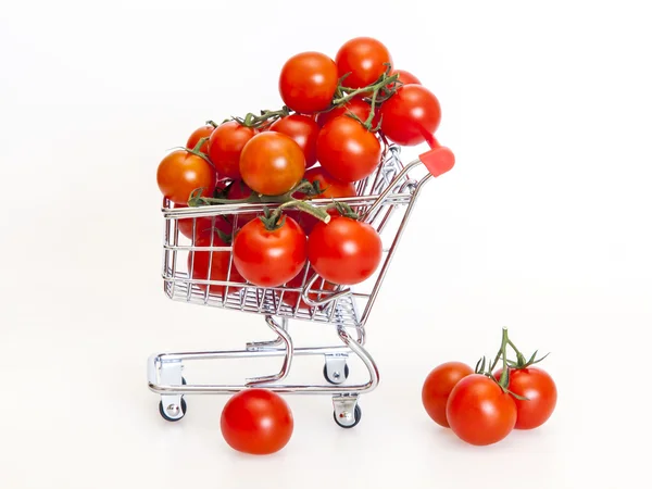 Cherry tomatoes in the store cart — Stock Photo, Image
