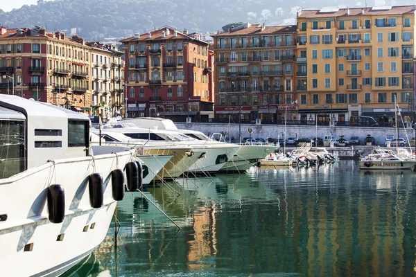 Nice, France, on March 10, 2015. Vessels and reflection in city port — Stock Photo, Image