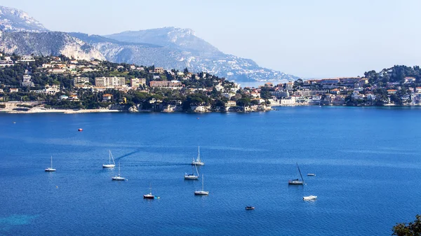 Nice, France, on March 10, 2015. The top view on a bay and the picturesque coast in the suburbs Vilfransh. — Stock Photo, Image