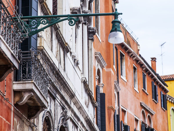 VENICE, ITALY - on APRIL 30, 2015. A fragment of the typical building on the city street.
