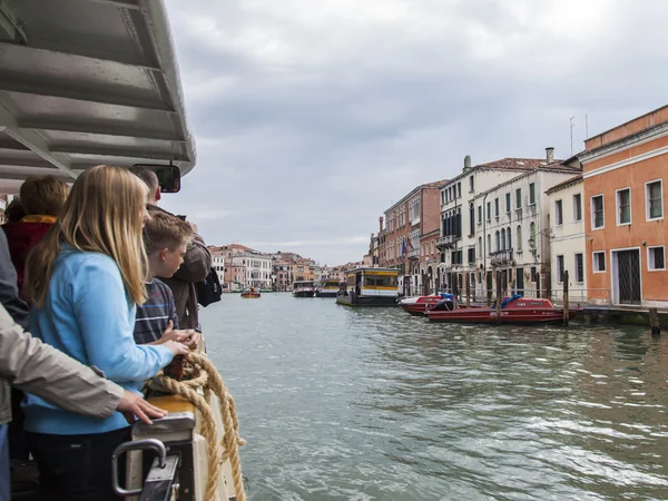 VENICE, ITALY - on APRIL 29, 2015. Vaporetto with passengers floats on the Grand channel (Canal Grande). Vaporetto - public transport in island part of Venice — Stock Photo, Image