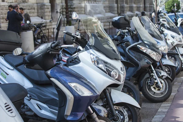 CANNES, FRANCE, on MARCH 12, 2015. Typical city landscape. A parking of motorcycles on the city street — Stock Photo, Image