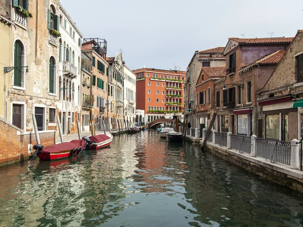 VENICE, ITALY - on MAY 1, 2015. Typical city landscape. Street canal and architectural complex of old buildings ashore — Stock Photo, Image