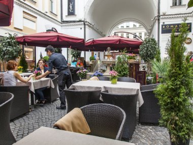 MOSCOW, RUSSIA, on June 24, 2015. Pyatnitskaya Street, cafe open-air. Pyatnitskaya Street is historical sight of the center of Moscow and one of shopping streets