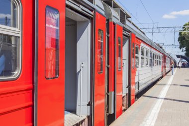 PUSHKINO, RUSSIA, on JUNE 24, 2015. A regional electric train at a platform of the city railway station